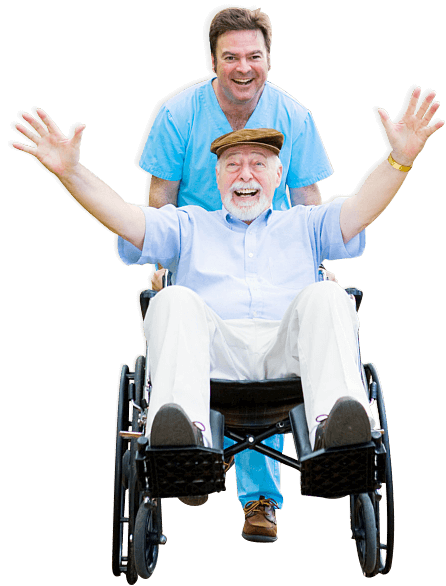 elderly patient laughing together with his caregiver